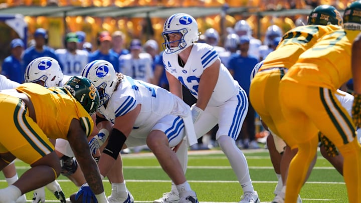 Sep 28, 2024; Waco, Texas, USA;  Brigham Young Cougars quarterback Jake Retzlaff (12) in action against the Baylor Bears during the first half at McLane Stadium. 