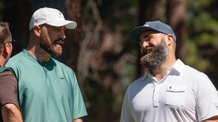 Travis Kelce and brother Jason Kelce talk on the 4th tee during the first round of the American Century Celebrity Championship golf tournament at Edgewood Tahoe Golf Course in Stateline, Nev., Friday, July 12, 2024.