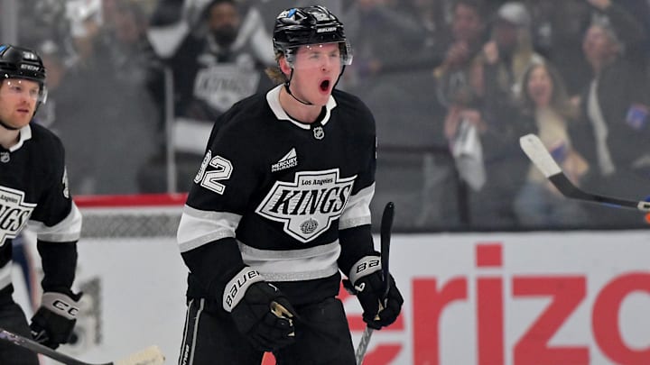 Apr 23, 2025; Los Angeles, California, USA;  Los Angeles Kings defenseman Brandt Clarke (92) celebrates after scoring a goal past Edmonton Oilers goaltender Stuart Skinner (74) in the first period of game 2 of the 2025 Stanley Cup Playoffs at Crypto.com Arena. Mandatory Credit: Jayne Kamin-Oncea-Imagn Images