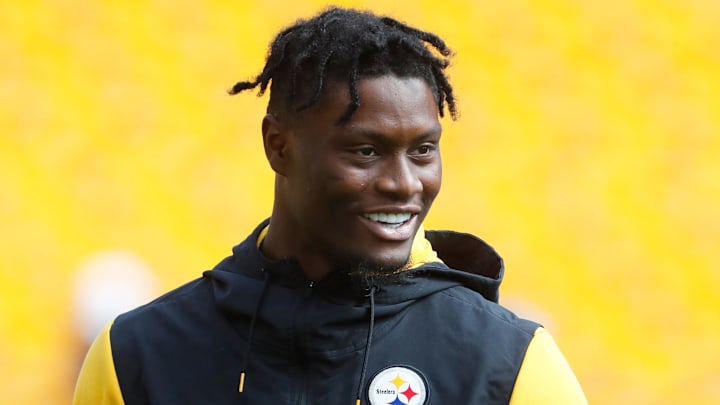 Pittsburgh Steelers wide receiver George Pickens smiles on the field before the game against the New England Patriots.
