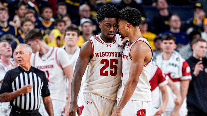 Wisconsin guard John Blackwell (25), left, celebrates a play against Michigan with guard Nick Boyd (2) during the second half at Crisler Center in Ann Arbor on Saturday, Jan. 10, 2026.