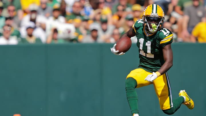 Green Bay Packers wide receiver Jayden Reed (11) leaps for a first down against the Indianapolis Colts during their football game Sunday, September 15, 2024, at Lambeau Field in Green Bay, Wisconsin. Green Bay Packers wide receiver Jayden Reed (11) leaps for a first down against the Indianapolis Colts during their football game Sunday, September 15, 2024, at Lambeau Field in Green Bay, Wisconsin.