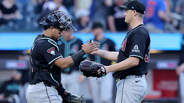 Jun 1, 2024; New York City, New York, USA; Arizona Diamondbacks relief pitcher Paul Sewald (38) shakes hands with catcher Gabriel Moreno (14) after defeating the New York Mets at Citi Field. Jun 1, 2024; New York City, New York, USA; Arizona Diamondbacks relief pitcher Paul Sewald (38) shakes hands with catcher Gabriel Moreno (14) after defeating the New York Mets at Citi Field.