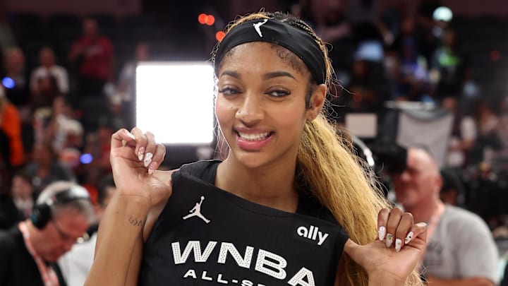 Team Collier forward Angel Reese celebrates after defeating Team Clark in the 2025 WNBA All Star Game at Gainbridge Fieldhouse.