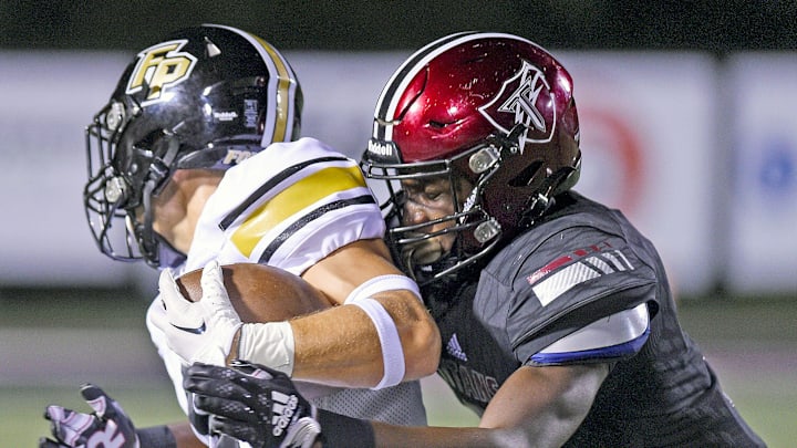 Ft. Payne  s Nolan Fowler makes a catch as Gadsden City  s Zyan Gibson defends during high school football action in Gadsden, Alabama September 15, 2023. (Dave Hyatt: The Gadsden Times)