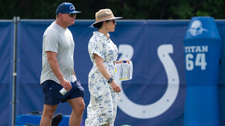Chris Ballard, Indianapolis Colts general manager, talks Friday, July 25, 2025, with Colts owner Carlie Irsay-Gordon during training camp held at Grand Park in Westfield.