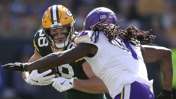 Green Bay Packers tight end Luke Musgrave takes on Minnesota Vikings cornerback Shaquill Griffin last season. Green Bay Packers tight end Luke Musgrave takes on Minnesota Vikings cornerback Shaquill Griffin last season.
