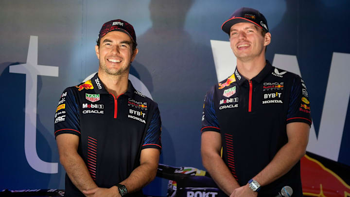 Oracle Red Bull Racing drivers Sergio Perez, left, and Max Verstappen speak at the Red Bull Fan Oracle Red Bull Racing drivers Sergio Perez, left, and Max Verstappen speak at the Red Bull Fan