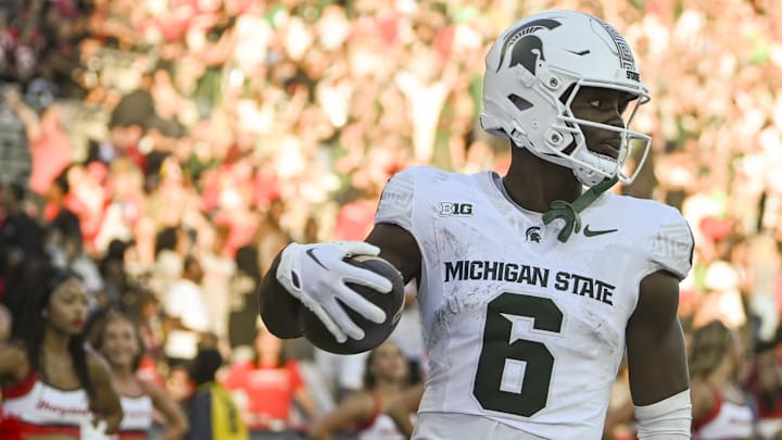 Sep 7, 2024; College Park, Maryland, USA; *Michigan State Spartans wide receiver Nick Marsh (6) celebrates after scoring a touchdown during the second half against the Maryland Terrapins  at SECU Stadium. Mandatory Credit: Tommy Gilligan-Imagn Images