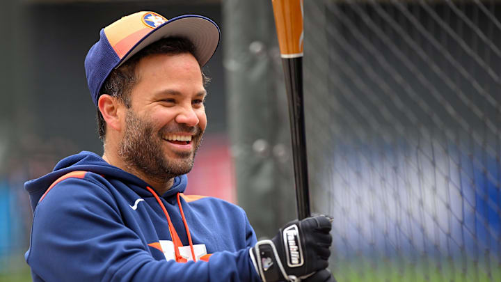 Apr 3, 2025; Minneapolis, Minnesota, USA;  Houston Astros outfielder Jose Altuve (27) has a laugh during batting practice before a game against the Minnesota Twins at Target Field.