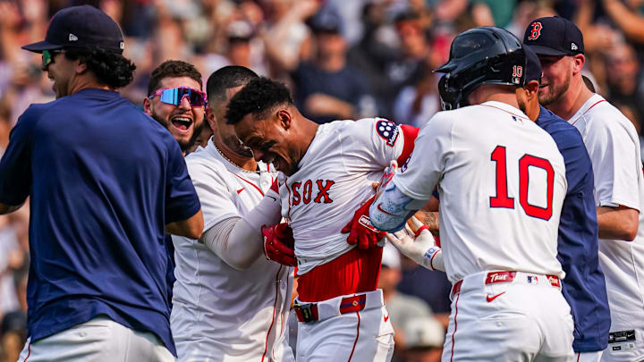 Jun 4, 2025; Boston, Massachusetts, USA; Boston Red Sox outfielder Ceddanne Rafaela (3) is congratulated after hitting a game winning home run against the Los Angeles Angels in the ninth inning at Fenway Park. Mandatory Credit: David Butler II-Imagn Images