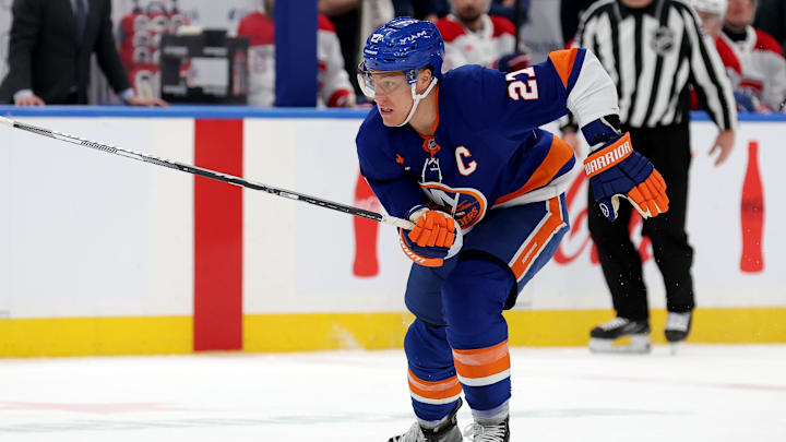 Mar 20, 2025; Elmont, New York, USA; New York Islanders left wing Anders Lee (27) skates against the Montreal Canadiens during the second period at UBS Arena. Mandatory Credit: Brad Penner-Imagn Images