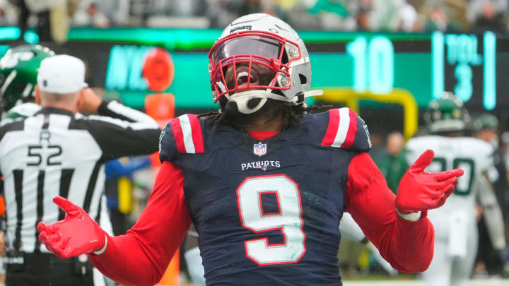  Sep 24, 2023; East Rutherford, New Jersey, USA; New York Jets quarterback Zach Wilson (2) is sacked for a safety by New England Patriots linebacker Matthew Judon (9) in the 4th quarter at MetLife Stadium. Mandatory Credit: Robert Deutsch-USA TODAY Sports