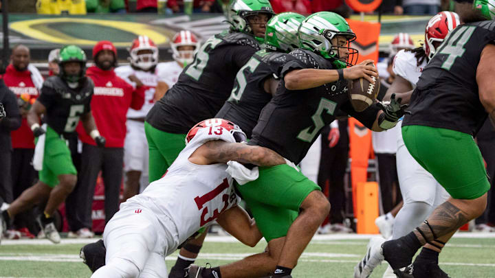 Indiana defensive lineman Kellan Wyatt sacks Oregon quarterback Dante Moore as the Oregon Ducks host the Indiana Hoosiers Oct. 11, 2025, at Autzen Stadium in Eugene, Oregon.
