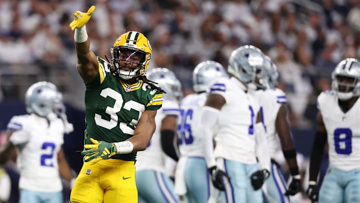 Jan 14, 2024; Arlington, Texas, USA; Green Bay Packers running back Aaron Jones (33) reacts against
