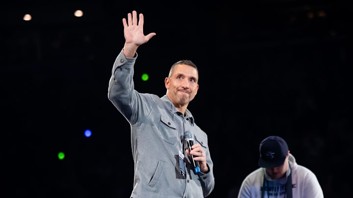 Penn State Nittany Lions football head coach Matt Campbell waves to the crowd during a Big Ten wrestling match against Nebraska.