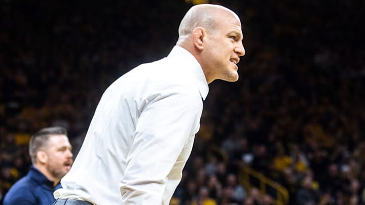 Penn State Nittany Lions coach Cael Sanderson calls out instructions during a Big Ten wrestling match vs. the Iowa Hawkeyes at Carver-Hawkeye Arena.