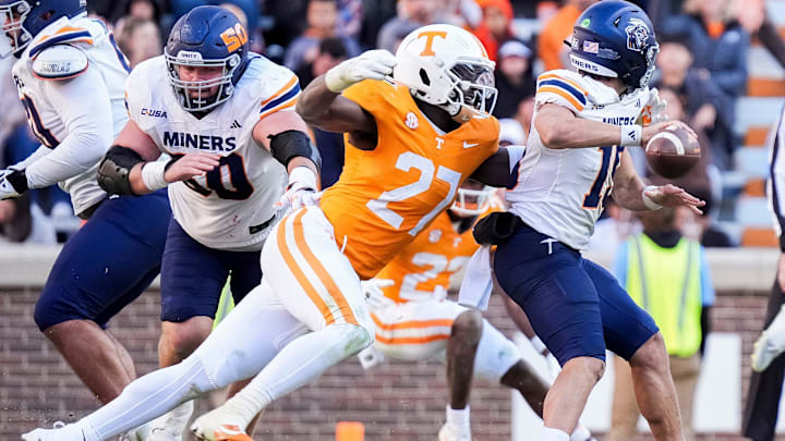 Nov 23, 2024; Knoxville, Tennessee, USA; Tennessee Volunteers defensive lineman James Pearce Jr. (27) sacks UTEP Miners quarterback JP Pickles (19) at Neyland Stadium. Mandatory Credit: Brianna Paciorka/USA TODAY Network via Imagn Images