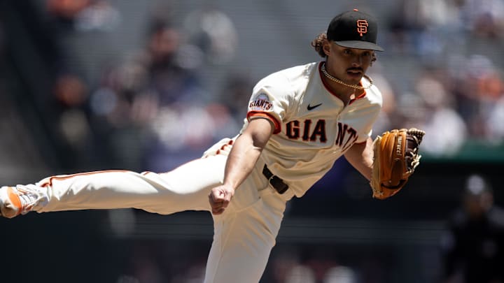 May 14, 2025; San Francisco, California, USA; San Francisco Giants starting pitcher Jordan Hicks (12) delivers a pitch against the Arizona Diamondbacks during the first inning at Oracle Park. Mandatory Credit: D. Ross Cameron-Imagn Images