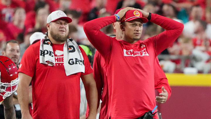 Aug 22, 2024; Kansas City, Missouri, USA; Kansas City Chiefs center Creed Humphrey (52) and quarterback Patrick Mahomes (15) react to play on the sidelines against the Chicago Bears during the game at GEHA Field at Arrowhead Stadium. Mandatory Credit: Denny Medley-USA TODAY Sports