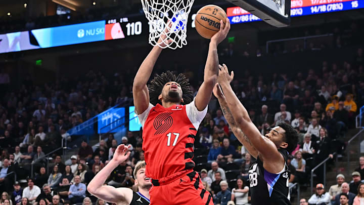 Apr 9, 2025; Salt Lake City, Utah, USA: Portland Trail Blazers guard Shaedon Sharpe (17) shoots for two points over the defense of Utah Jazz forward Brice Sensabaugh (28) in the second half at Delta Center. Mandatory Credit: Jamie Sabau-Imagn Images