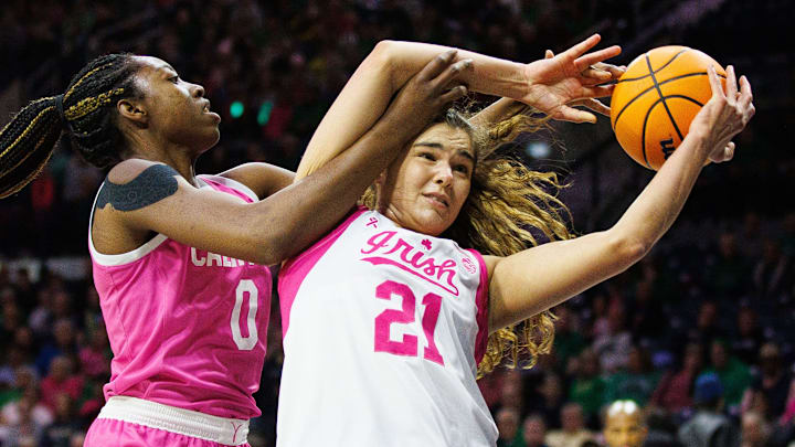 Cal's Michelle Onyaih (left) battles Notre Dame forward Maddy Westbeld Cal's Michelle Onyaih (left) battles Notre Dame forward Maddy Westbeld