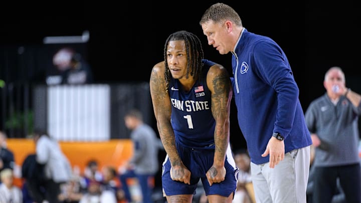 Penn State Nittany Lions guard Ace Baldwin Jr. (1) and head coach Mike Rhoades talk during the second half against the Virginia Tech Hokies at CFG Bank Arena. Penn State Nittany Lions guard Ace Baldwin Jr. (1) and head coach Mike Rhoades talk during the second half against the Virginia Tech Hokies at CFG Bank Arena.