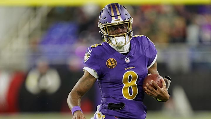 Nov 27, 2025; Baltimore, Maryland, USA; Baltimore Ravens quarterback Lamar Jackson (8) rushes the ball against the Cincinnati Bengals during the second half at M&T Bank Stadium. Mandatory Credit: Mitch Stringer-Imagn Images