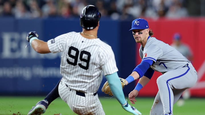 Sep 9, 2024; Bronx, New York, USA; Kansas City Royals shortstop Bobby Witt Jr. (7) tags out New York Yankees designated hitter Aaron Judge (99) at second base to complete a double play on a ball hit by Yankees catcher Austin Wells (not pictured) during the fifth inning at Yankee Stadium. Mandatory Credit: Brad Penner-Imagn Images Sep 9, 2024; Bronx, New York, USA; Kansas City Royals shortstop Bobby Witt Jr. (7) tags out New York Yankees designated hitter Aaron Judge (99) at second base to complete a double play on a ball hit by Yankees catcher Austin Wells (not pictured) during the fifth inning at Yankee Stadium. Mandatory Credit: Brad Penner-Imagn Images