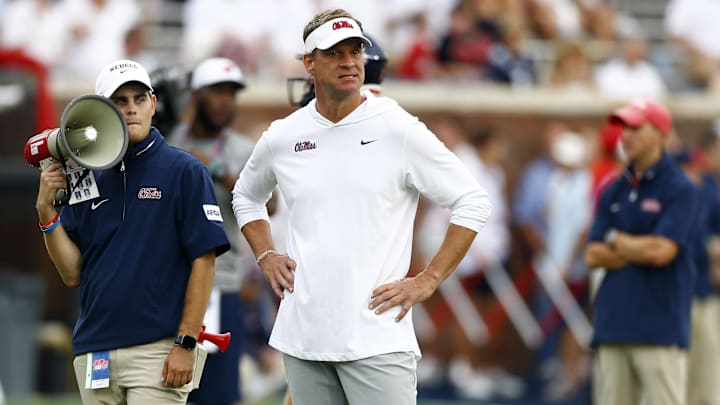 Aug 31, 2024; Oxford, Mississippi, USA; Mississippi Rebels head coach Lane Kiffin watches during warm ups prior to the game against the Furman Paladins at Vaught-Hemingway Stadium. Mandatory Credit: Petre Thomas-Imagn Images
