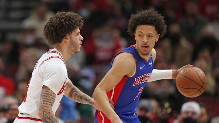 Jan 11, 2022; Chicago, Illinois, USA; (Editors note: caption correction) Detroit Pistons guard Cade Cunningham (2) is defended by Chicago Bulls guard Lonzo Ball (left) during the first quarter at the United Center. Mandatory Credit: Dennis Wierzbicki-Imagn Images