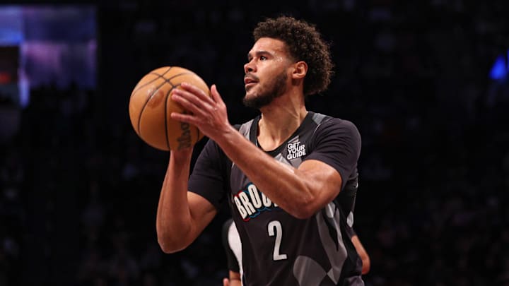 Mar 24, 2025; Brooklyn, New York, USA; Brooklyn Nets forward Cameron Johnson (2) shoots the ball during the first half against the Dallas Mavericks at Barclays Center. Mandatory Credit: Vincent Carchietta-Imagn Images