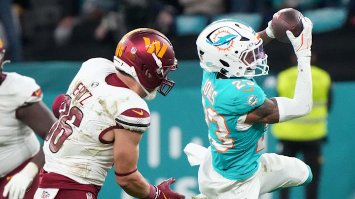 Miami Dolphins cornerback Jack Jones (23) interception a pass intended for Washington Commanders tight end Zach Ertz (86) in overtime during the 2025 NFL Madrid Game at Santiago Bernabeu Stadium.