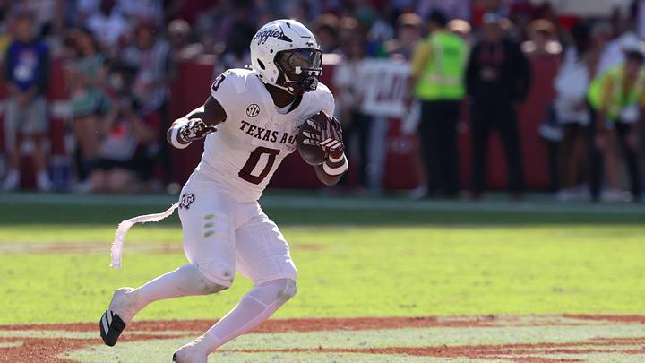 Oct 24, 2026; Tuscaloosa, Alabama, USA; Texas A&M Aggies running back KJ Edwards (0) runs the ball against the Alabama Crimson Tide during the first half at Saban Field at Bryant-Denny Stadium. Mandatory Credit: David Leong-Imagn Images Oct 24, 2026; Tuscaloosa, Alabama, USA; Texas A&M Aggies running back KJ Edwards (0) runs the ball against the Alabama Crimson Tide during the first half at Saban Field at Bryant-Denny Stadium. Mandatory Credit: David Leong-Imagn Images