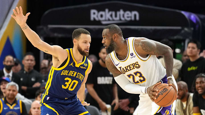 Jan 27, 2024; San Francisco, California, USA; Los Angeles Lakers forward LeBron James (23) handles the ball against Golden State Warriors guard Stephen Curry (30) during overtime at Chase Center. Mandatory Credit: Darren Yamashita-Imagn Images Jan 27, 2024; San Francisco, California, USA; Los Angeles Lakers forward LeBron James (23) handles the ball against Golden State Warriors guard Stephen Curry (30) during overtime at Chase Center. Mandatory Credit: Darren Yamashita-Imagn Images