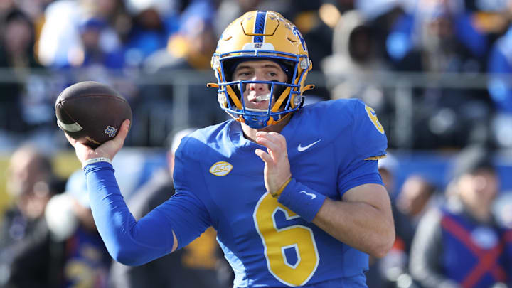Nov 29, 2025; Pittsburgh, Pennsylvania, USA;  Pittsburgh Panthers quarterback Mason Heintschel (6) passes against the Miami Hurricanes during the first quarter at Acrisure Stadium. Mandatory Credit: Charles LeClaire-Imagn Images