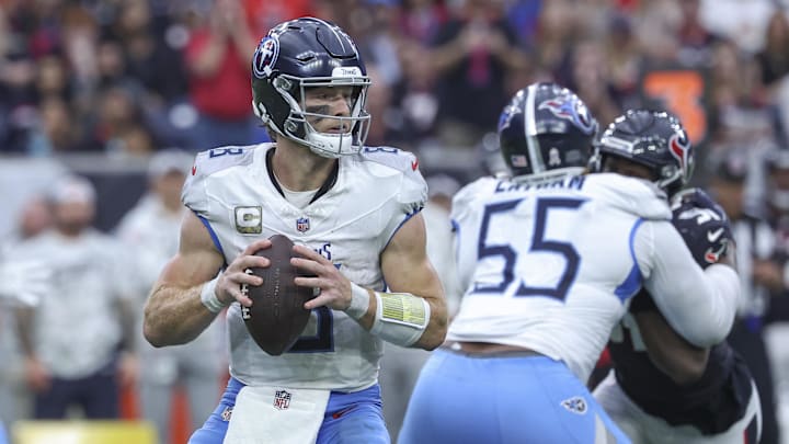 Nov 24, 2024; Houston, Texas, USA; Tennessee Titans quarterback Will Levis (8) looks for an open receiver during the third quarter against the Houston Texans at NRG Stadium. Mandatory Credit: Troy Taormina-Imagn Images