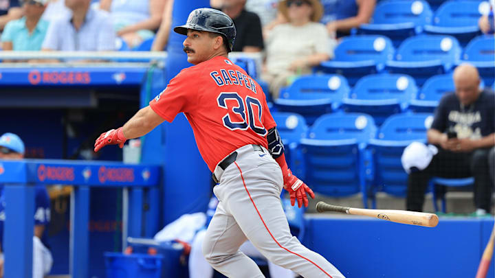 Mar 2, 2026; Dunedin, Florida, USA;  Boston Red Sox second baseman Mickey Gasper (30) singles during the third inning against the Toronto Blue Jays at TD Ballpark. Mandatory Credit: Kim Klement Neitzel-Imagn Images
