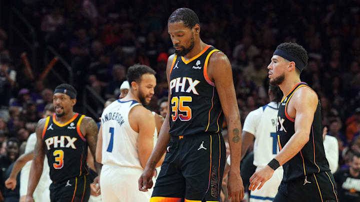 Apr 26, 2024; Phoenix, Arizona, USA; Phoenix Suns guard Bradley Beal (3) and Phoenix Suns forward Kevin Durant (35) and Phoenix Suns guard Devin Booker (1) react while Minnesota Timberwolves celebrate during the second half of game three of the first round for the 2024 NBA playoffs at Footprint Center. Mandatory Credit: Joe Camporeale-Imagn Images Apr 26, 2024; Phoenix, Arizona, USA; Phoenix Suns guard Bradley Beal (3) and Phoenix Suns forward Kevin Durant (35) and Phoenix Suns guard Devin Booker (1) react while Minnesota Timberwolves celebrate during the second half of game three of the first round for the 2024 NBA playoffs at Footprint Center. Mandatory Credit: Joe Camporeale-Imagn Images
