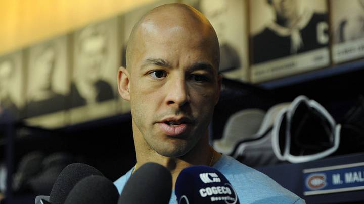 May 14, 2015; Montreal, Quebec, CAN; Montreal Canadiens forward Manny Malhotra (20) faces the media during a press conference at the Bell Sports Complex. Mandatory Credit: Eric Bolte-Imagn Images