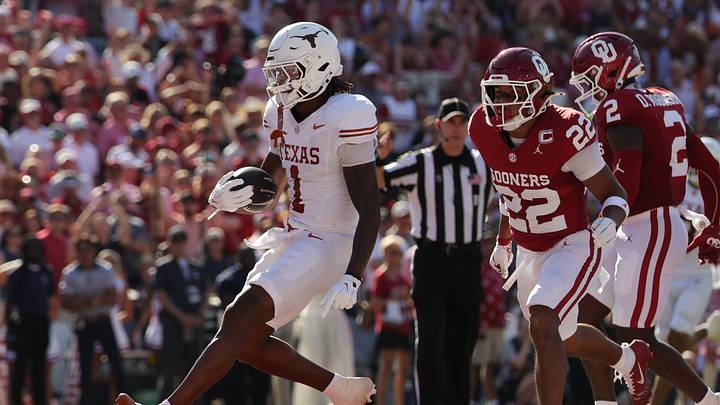 Oct 10, 2026; Dallas, Texas, USA;  Texas Longhorns wide receiver Ryan Wingo (1) scores a touchdown against the Oklahoma Sooners during the first half at Cotton Bowl.  Mandatory Credit: Kevin Jairaj-Imagn Images