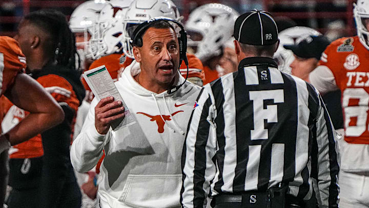 Dec 21, 2024; Austin, Texas, USA; Texas Longhorns head coach Steve Sarkisian disputes a call against the Clemson Tigers in the first round of the College Football Playoffs at Darrell K Royal-Texas Memorial Stadium. Mandatory Credit: Aaron E. Martinez/USA Today Network via Imagn Images