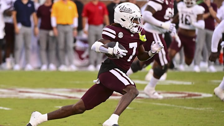 Oct 19, 2024; Starkville, Mississippi, USA; Mississippi State Bulldogs wide receiver Mario Craver (7) runs the ball against the Texas A&M Aggies before suffering an apparent injury on the play during the third quarter at Davis Wade Stadium at Scott Field. Mandatory Credit: Matt Bush-Imagn Images
