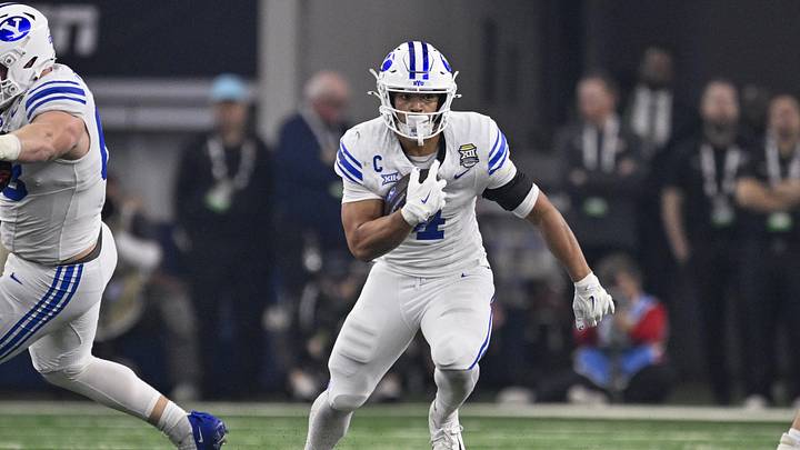Dec 6, 2025; Arlington, TX, USA; BYU Cougars running back LJ Martin (4) runs with the ball during the game between the Red Raiders and the Cougars at AT&T Stadium. Mandatory Credit: Jerome Miron-Imagn Images