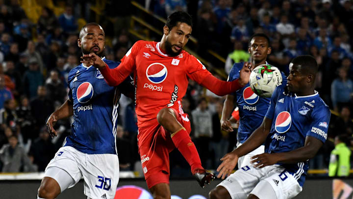 Millonarios y América de Cali en un partido.