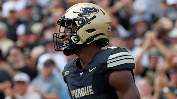 Purdue Boilermakers wide receiver De'Nylon Morrissette (8) smiles after scoring a touchdown