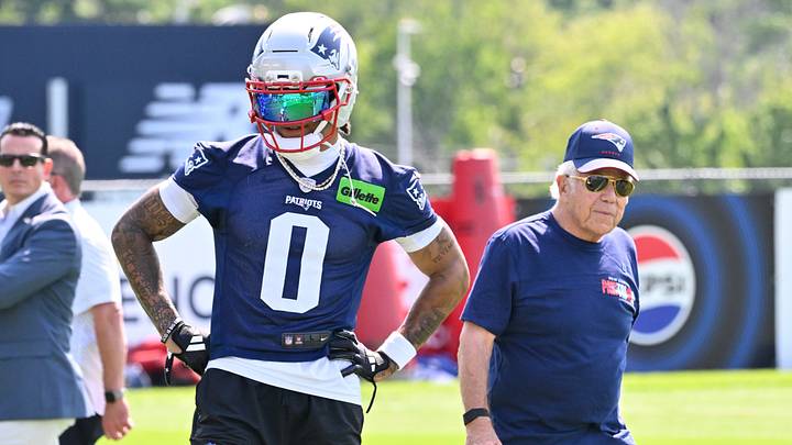 Jul 25, 2026; Foxborough, MA, USA; New England Patriots cornerback Christian Gonzalez (0) and owner Robert Kraft attend  training camp at Gillette Stadium. Mandatory Credit: Eric Canha-Imagn Images