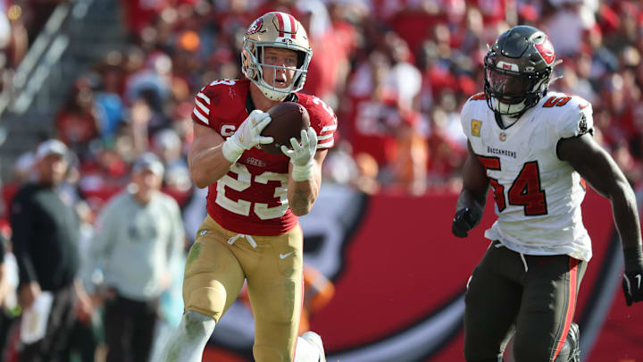 Nov 10, 2024; Tampa, Florida, USA; San Francisco 49ers running back Christian McCaffrey (23) catches the ball over Tampa Bay Buccaneers linebacker Lavonte David (54) during the second half at Raymond James Stadium. Mandatory Credit: Kim Klement Neitzel-Imagn Images Nov 10, 2024; Tampa, Florida, USA; San Francisco 49ers running back Christian McCaffrey (23) catches the ball over Tampa Bay Buccaneers linebacker Lavonte David (54) during the second half at Raymond James Stadium. Mandatory Credit: Kim Klement Neitzel-Imagn Images