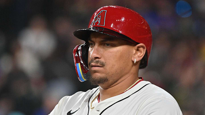 Mar 28, 2025; Phoenix, Arizona, USA;  Arizona Diamondbacks first base Josh Naylor (22) looks on in the third inning against the Chicago Cubs at Chase Field. Mandatory Credit: Matt Kartozian-Imagn Images