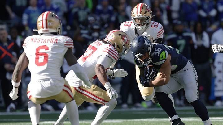 Oct 11, 2026; Seattle, Washington, USA; Seattle Seahawks running back George Holani (36) runs the ball against San Francisco 49ers safety Ji'Ayir Brown (27) and linebacker Jaden Dugger (53) during the first half at Lumen Field. Mandatory Credit: Joe Nicholson-Imagn Images Oct 11, 2026; Seattle, Washington, USA; Seattle Seahawks running back George Holani (36) runs the ball against San Francisco 49ers safety Ji'Ayir Brown (27) and linebacker Jaden Dugger (53) during the first half at Lumen Field. Mandatory Credit: Joe Nicholson-Imagn Images